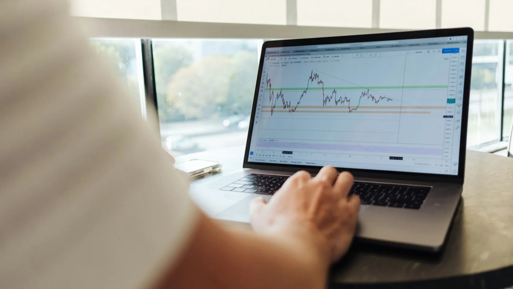 Founder planning subscription app pricing strategy with monthly and annual plan options