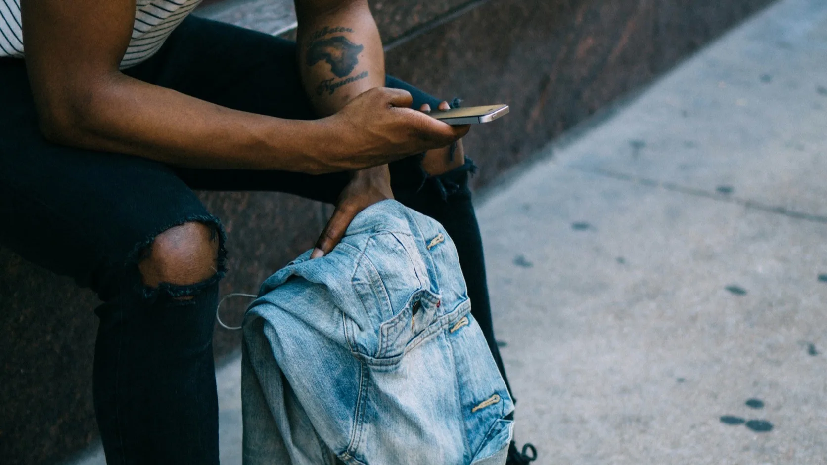 Smartphone on a table symbolizing waiting for a text