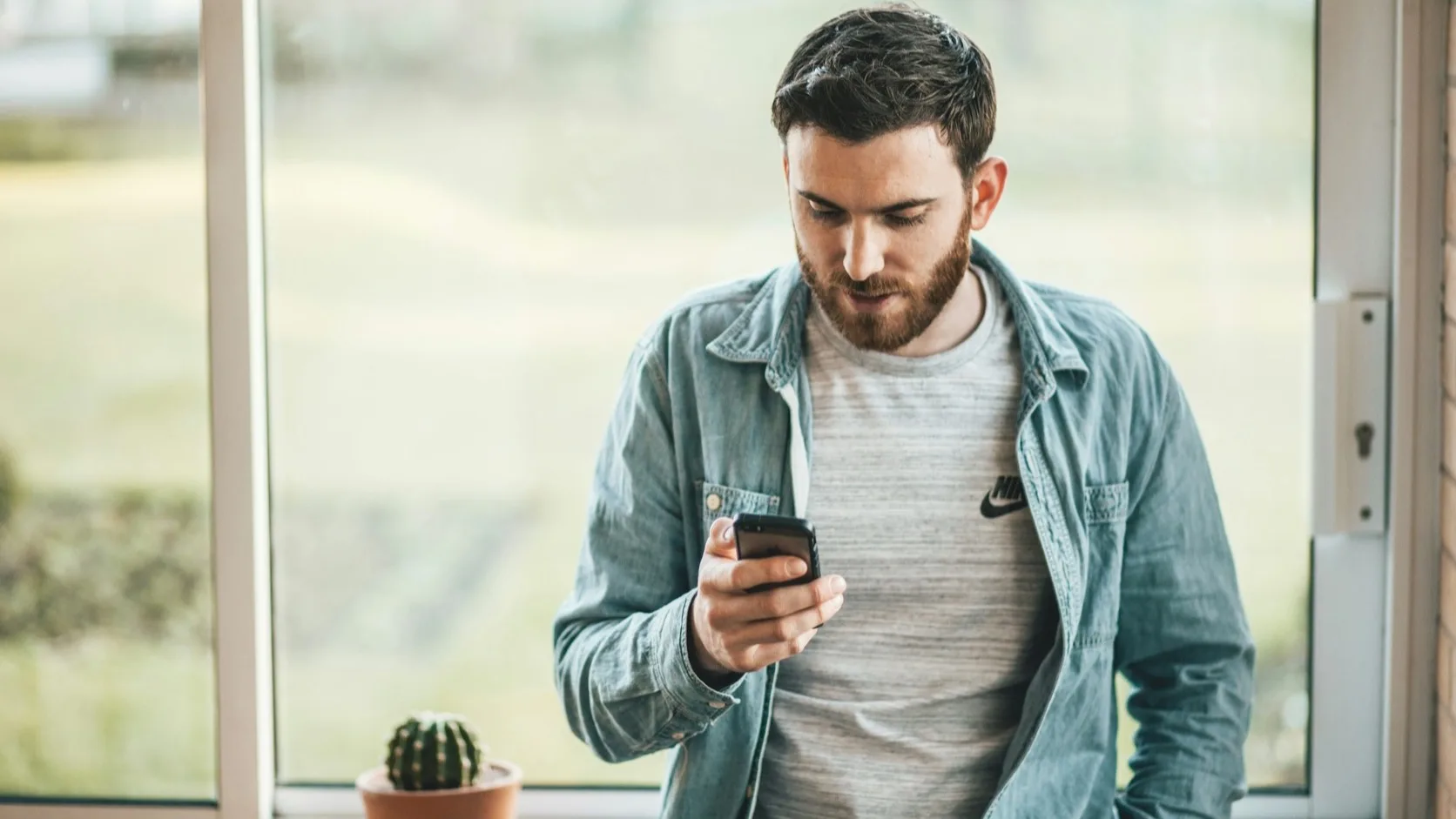 A dating app chat showing a short one-word reply